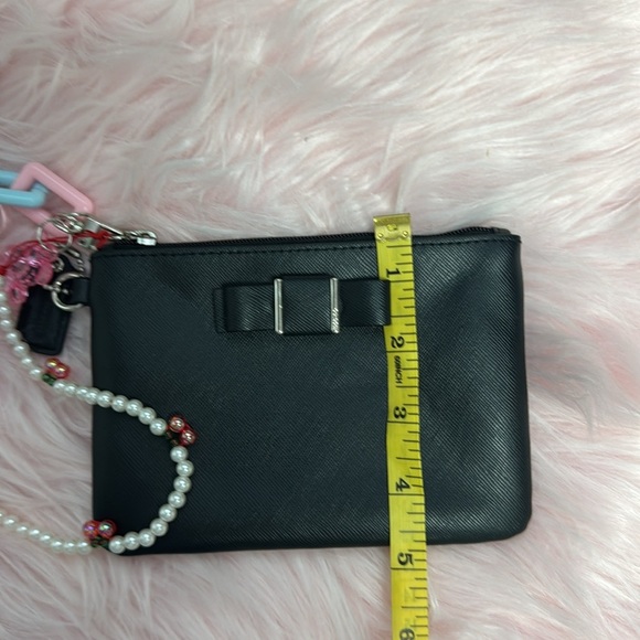 Elegant Black Women's Coach wristlet with bow coquette - Picture 6 of 6